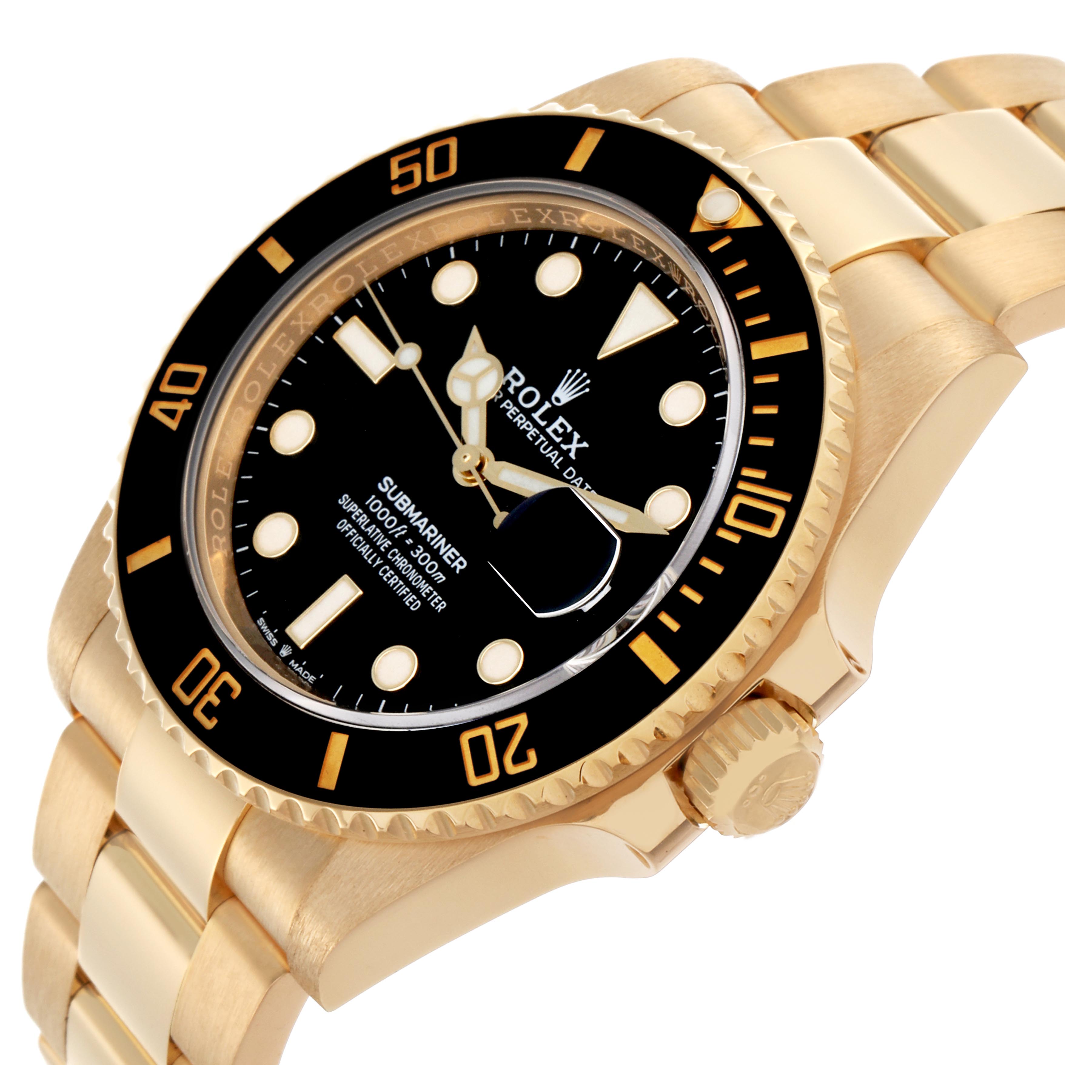 The Rolex Submariner 126618 Men's Yellow Gold Black Dial watch is shown at an angle highlighting the black bezel, gold casing, dial, crown, and bracelet.